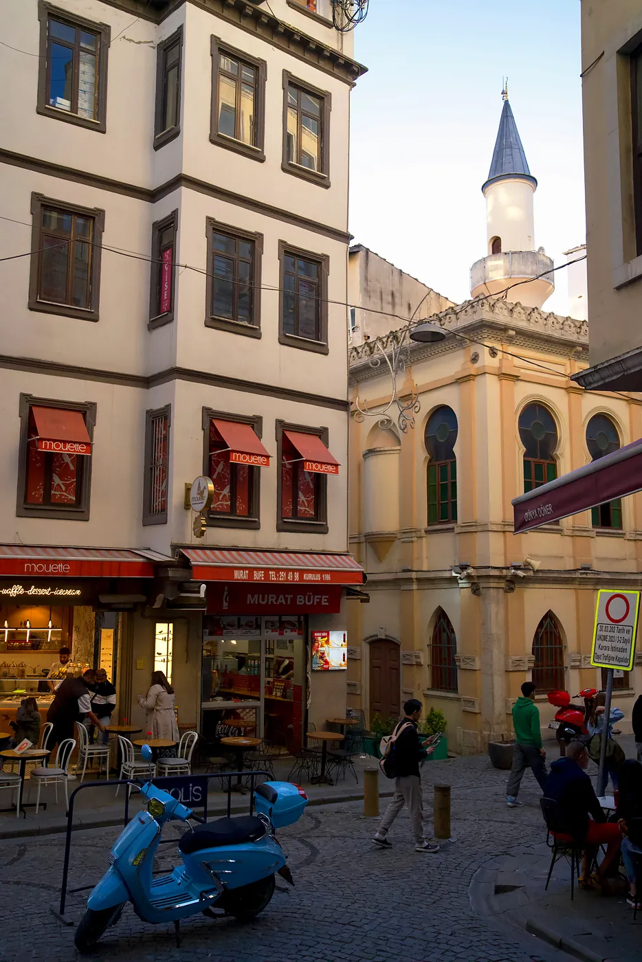 A cafe situated on a quiet street.